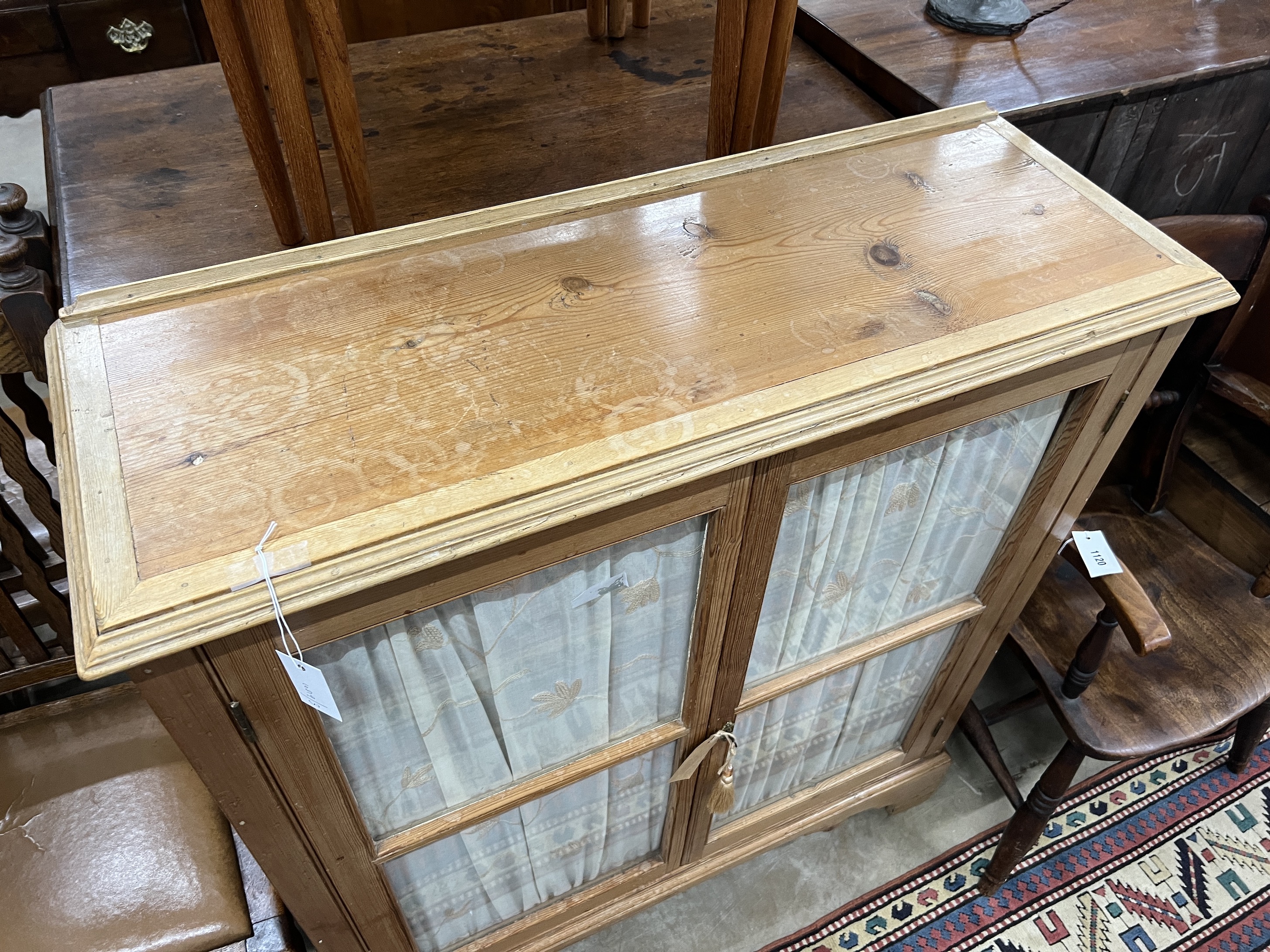A Victorian and later glazed pine two door side cabinet, width 93cm, depth 33cm, height 108cm